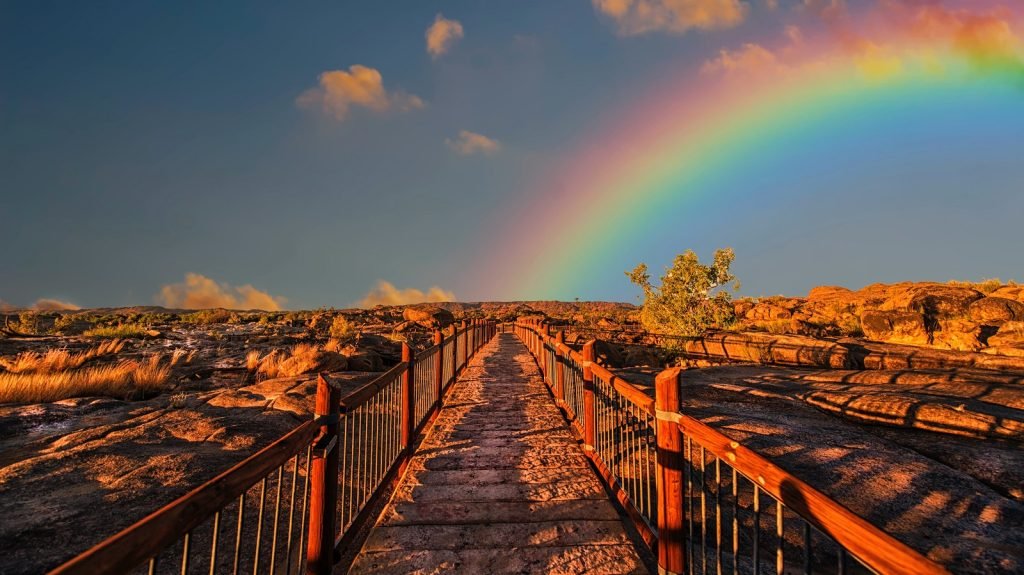 a rainbow and a bridge